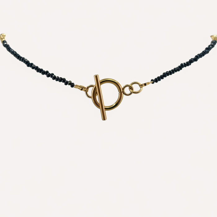 Collier doré Iris-perles de verre facettées et fermoir en T