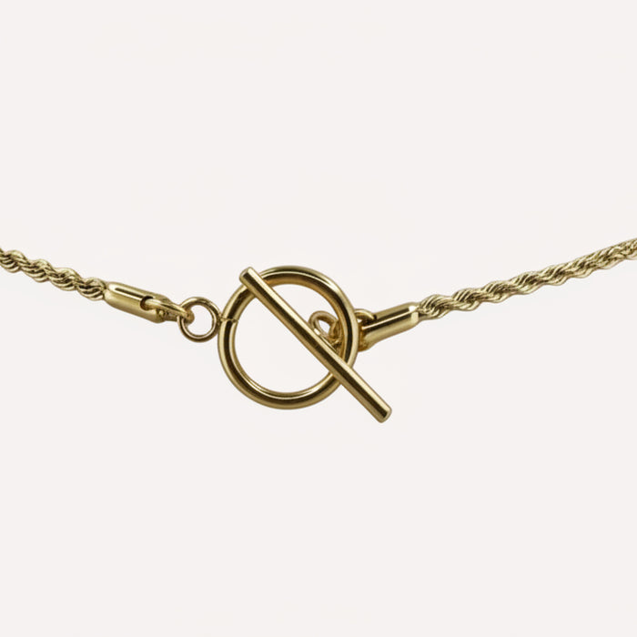 Chaine dorée Eva-pendentif croix multicolore et fermoir en T