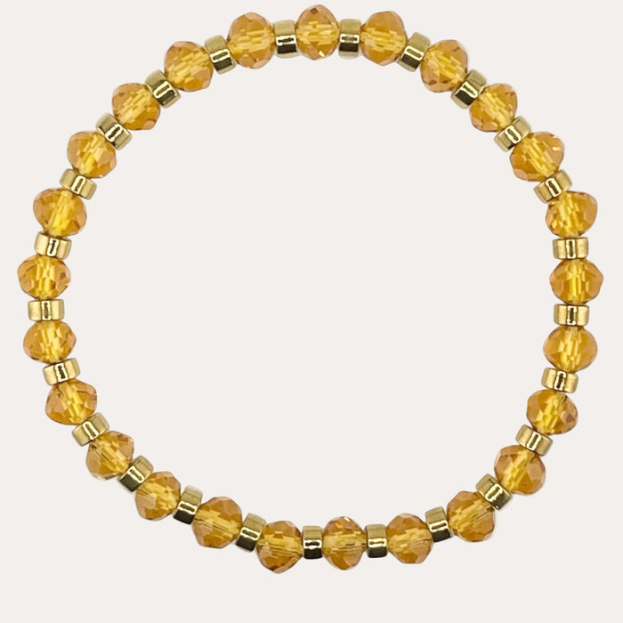 Bracelet doré Jeanne-perles à facettes et élastique